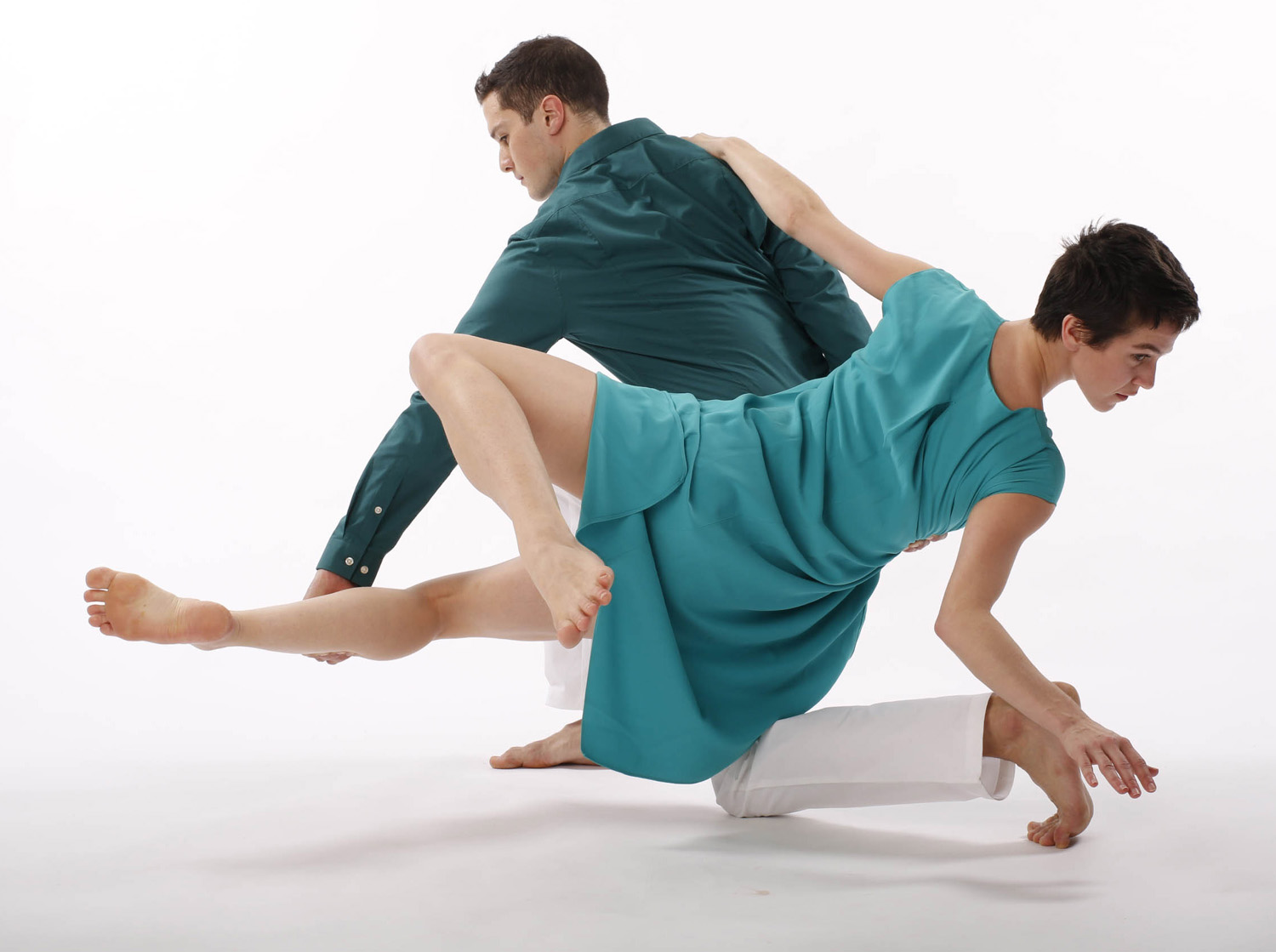 Two dancers practicing in studio
